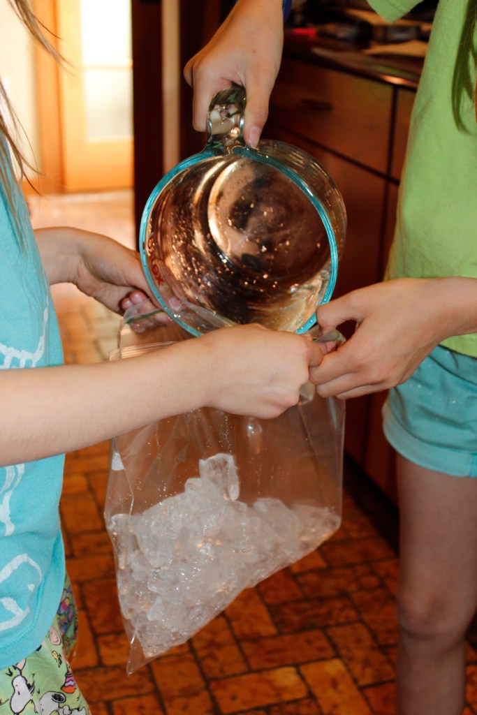 The key to minimal clean up is to have one person hold the bags open while the other pours.